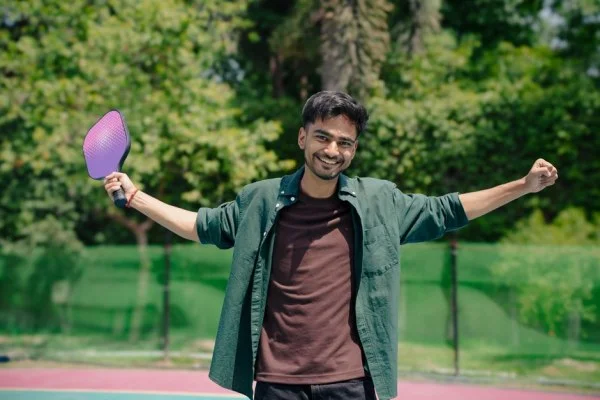 tennis player celebrating win